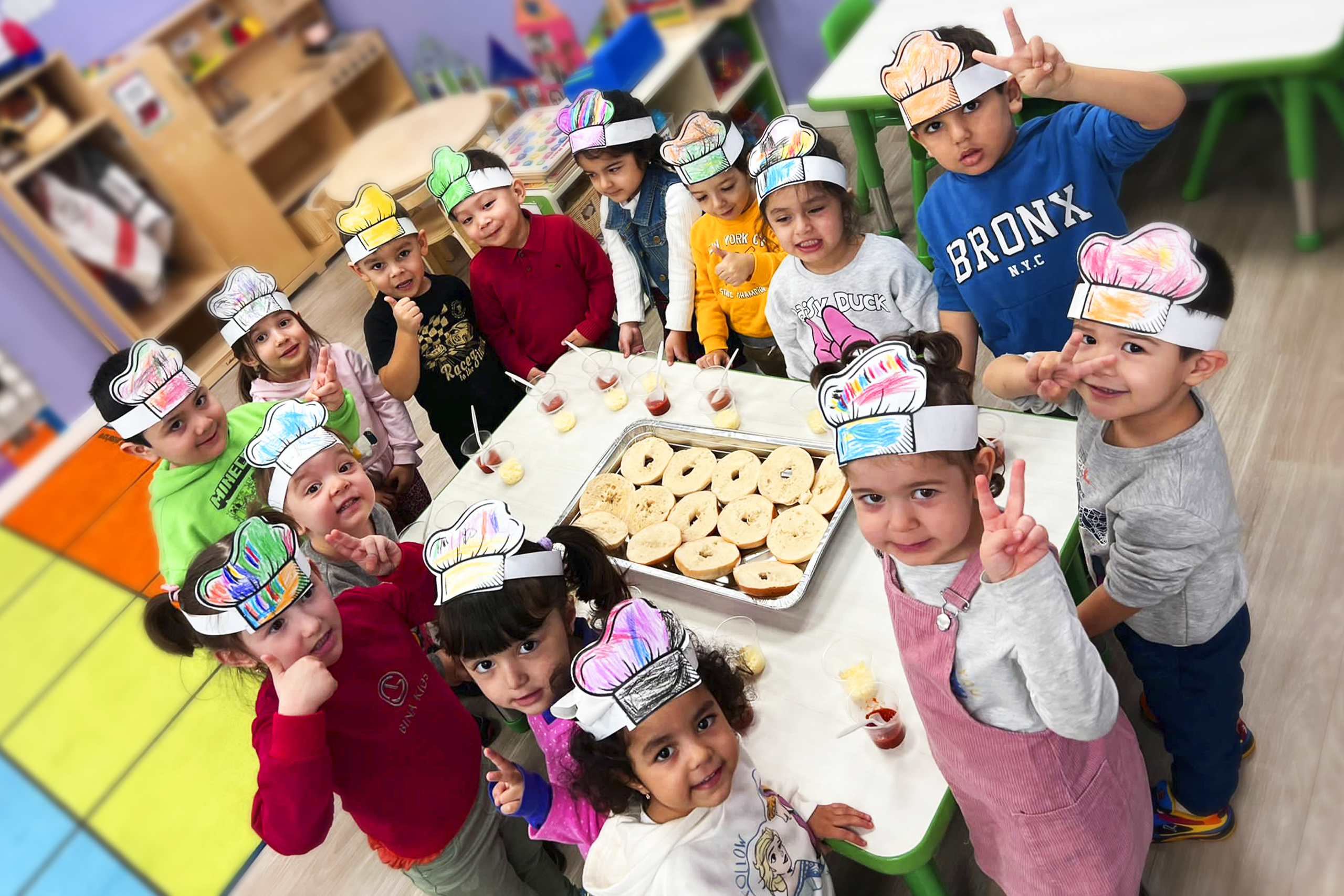 Children cook food in Daycare Little Scholars