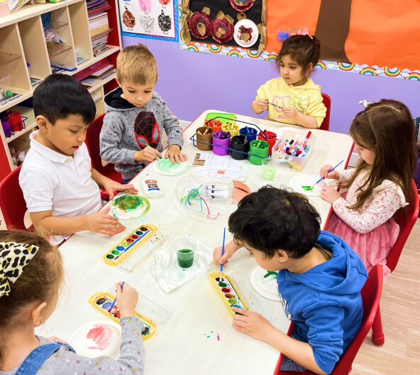 Children participating in an art and craft session at Little Scholars Daycare
