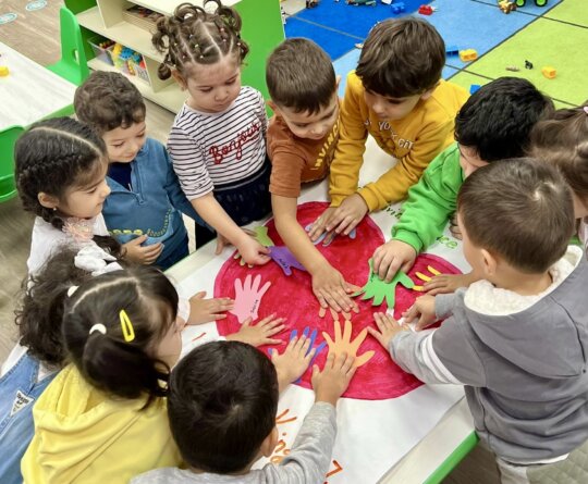 preschool-children-engaging-in-handprint-activity